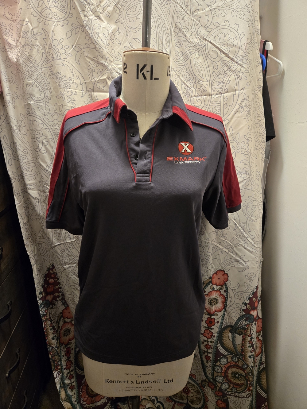 Women’s Polo in Charcoal with Red Accents Exmark Mowers University.